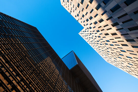 Low angle view of modern office buildings in the financial area of Poblenou in the city of Barcelona in Catalonia in Spain