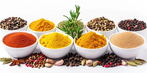 Assortment of different dry spices with leaf in white ceramic round cups on a white background. Spicy and savory spices for cooking and seasoning dishes. © dinastya