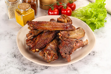 Roasted duck wings with sauce