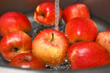 red apples washed in water
