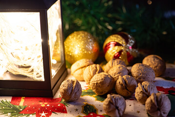 Christmas scene with walnuts, beautiful christmas scene with walnuts on rustic wood, selective focus.