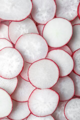 Slices of fresh radish as background