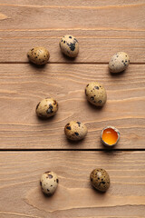 Fototapeta na wymiar Fresh quail eggs on wooden background
