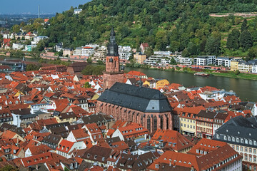 Church of the Holy Spirit in Heidelberg Old Town, Germany. View from the lower slope of Konigstuhl hill. The church was constructed between 1398 and 1515. - 707338540