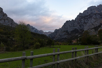 Sunrise landscape over Picos de Europa national park in northern Cantabrian mountains of Spain during bright and sunny autumn day