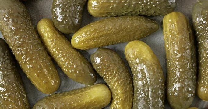 Close-up of pickled or salted cucumbers background
