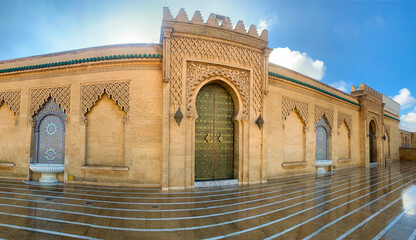  Arabic Door, Arabic oriental styled door in Rabat, Morocco. Panoramic view of square and Mausoleum of King Mohammed V located on opposite side Hassan Tower in Rabat. Morocco  - obrazy, fototapety, plakaty