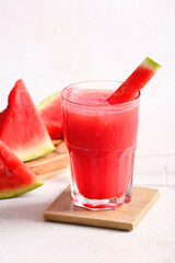 Glass of tasty watermelon fresh on light background