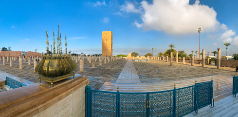 Panoramic view of square and Mausoleum of King Mohammed V located on opposite side Hassan Tower in...