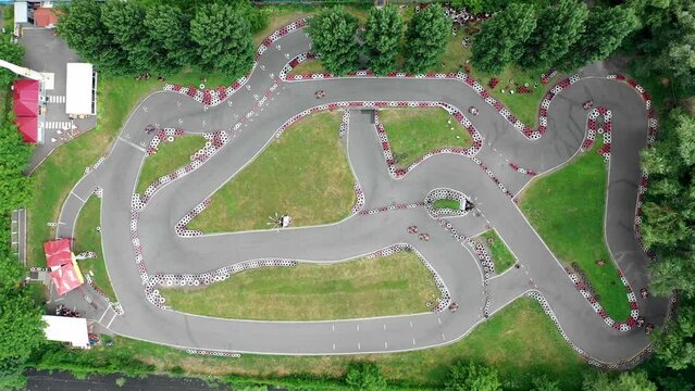 FPV, KIEV, Ukraine - April 9, 2021: race track seagull go-kart on the road Issue Drone view 4K, Kart pilot during training, Kart crossing the finish line, Rally races line track or road marking. Start