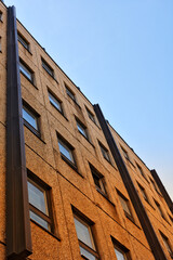 Fototapeta na wymiar Low angle view of modern apartment building in Berlin