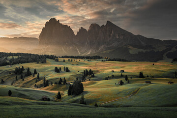 Sunrise at Seiser Alm with meadows and mountain range in the European Dolomite Alps, a Dolomite...