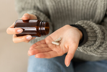 hands young woman holding medicine herbs capsules