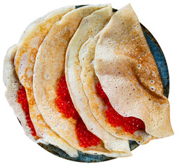 Pancakes with red caviar dished up in flat service plate. Isolated over white background