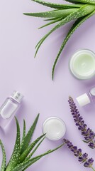 Obraz na płótnie Canvas Arrangement of aloe skincare products, delicate containers set with aloe vera leaves on a pastel lavender vertical background