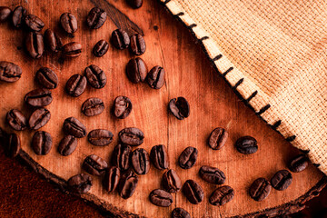 Coffee beans on wood and fabric