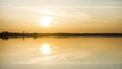 Fototapeta na wymiar Sunset over the lake, golden hour, Croatia