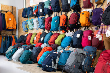 On wall and floor there is showcase with backpack for travelers and tourists - for climbing and...