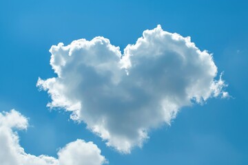 Naklejka na ściany i meble Heart-shaped cloud in a clear blue sky