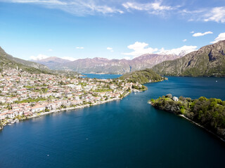 Fototapeta na wymiar Aerial view of Pusiano Lake and Isola dei Cipressi, in Como, Lombardy.