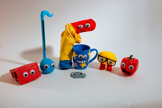 Silly little thingies all together with googly eyes and primary colors. Childrens toys and adult merchandising.