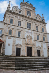 Fototapeta na wymiar Stairs and facade of the majestic cathedral of Santarém PORTUGAL