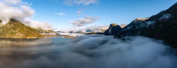 Fototapeta na wymiar Aerial View of Canadian Mountain Landscape. Sunny Winter Day. British Columbia, Canada.