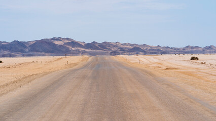 Fototapeta na wymiar Driving along the coast of Namibia near Cape Cross