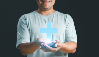 Mental health care mental rejuvenation concept. Man smiling good mood hand holding virtual blue...