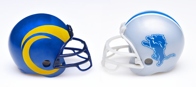 IRVINE, CALIFORNIA - 11 Jan 2024: Football helmets of the LA Rams and the Detroit Lions opponents in the Wild Card Round of the playoffs.