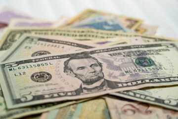 Closeup Money background,US dollar banknote background, Money scattered on the desk, Photography for business Finance and Economy concepts