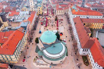 Aerial skyline view about the christmas market at downtown of Pecs next to Mosque of Pasha Gazi...