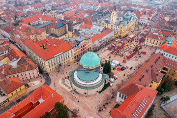Aerial skyline view about the christmas market at downtown of Pecs with the Mosque of Pasha Gazi...