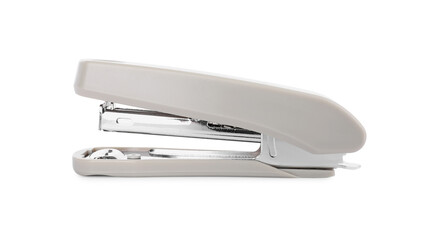 One new beige stapler isolated on white