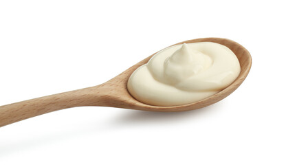 Fresh mayonnaise sauce in wooden spoon isolated on white