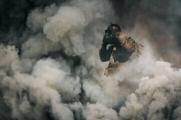 Military soldier with mask between smoke and gas in battlefield	 - obrazy, fototapety, plakaty