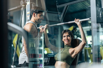 Caucasian fitness trainer motivate sportswoman exercise in gym stadium.