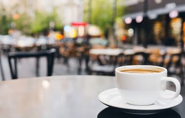 Fototapeta premium cup of coffee on the street