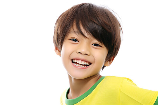 Asian little boy smiling and looking at camera isolated on white background.