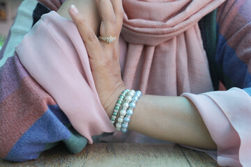 Jeweler bracelet on the female wrist. 