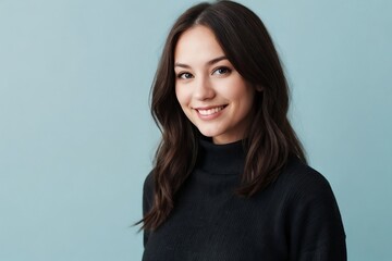 Obraz premium Attractive woman wearing a black turtleneck sweater is standing against the blue background with copy space.