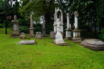 A group of gravestones were removed and placed here from the old Bukit Timah Cemetery when it was...