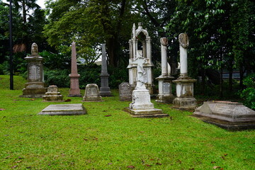 A group of gravestones were removed and placed here from the old Bukit Timah Cemetery when it was...