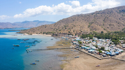 Aerial view island life or typical fisherman village called Komodo Village located in Komodo National Park, East Nusa Tenggara, Indonesia. © Yusnizam Yusof