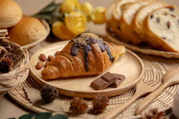 Chocolate Croissants on a wooden plate