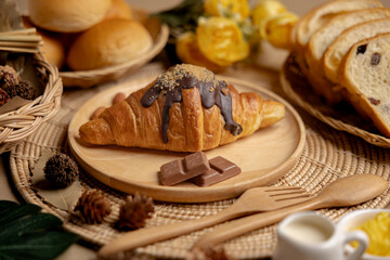 Chocolate Croissants on a wooden plate