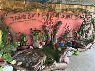 Sandakan Crocodile Farm. The second largest town in Sabah, Malaysia. Known as the Natural City, Sandakan visitors have the opportunity to explore wildlife sanctuaries and discovery centers.