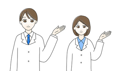 笑顔で案内する白衣の男性と女性