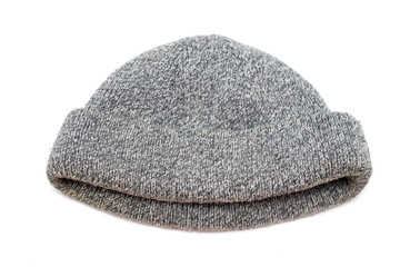 Fototapeta na wymiar knitted gray wool hat on a white background.