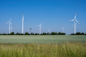 Wind energy turbines in cereal fields seen in Germany